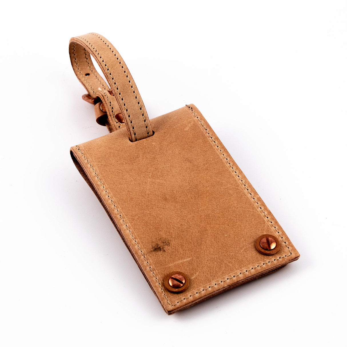 Tom Dixon Travel tag til bagasjen i flere farger.