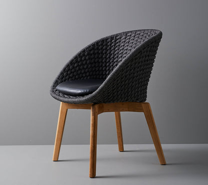 Cane-line Peacock stol med svarte teakbein, indoor