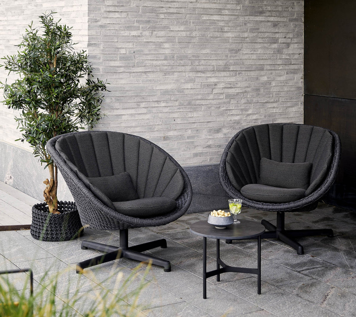 Cane-line Peacock loungestol med svingbart understell i aluminium
