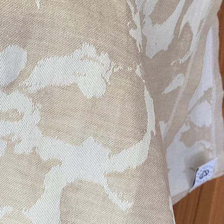 Plesner Patterns kjøkkenhåndkle i beige.