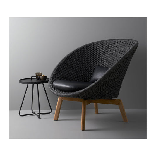 Cane-line Peacock loungestol med svarte teakbein, indoor, inkl. putesett Smoky Flavour