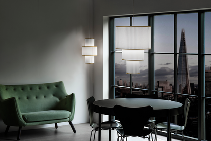 LE KLINT Modell 111 Plivello pendel Ø30 × H49 cm i interiør