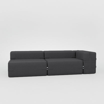 Sofa bygget av grå moduler