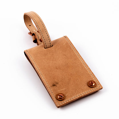 Tom Dixon Travel tag til bagasjen i flere farger.